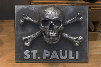 Skull and crossbones sign in a fan merchandise shop