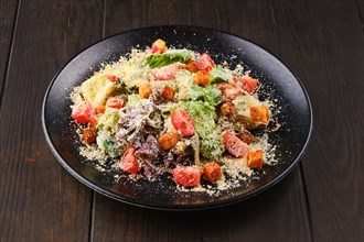 Caesar salad with fresh vegetables