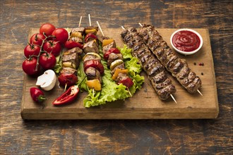 High angle chopping board with delicious kebab vegetables