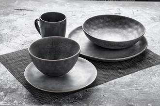 Set of clay dishes and bowl