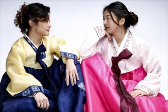 Two seated woman in Korean traditional costume