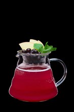 Apple and black currant hot tea isolated on black. Healthy raw food concept. Photo with clipping path