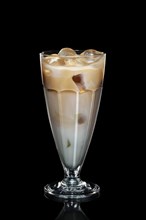 Cream and coffee ice cocktail isolated on black