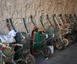 Collection of wheelbarrows at a construction site