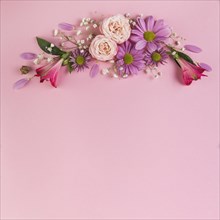 Flower decoration against pink background