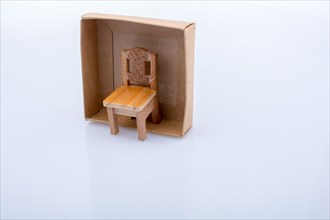 Colorful little wooden toy chair in view