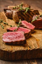 Closeup view of juicy grilled beef steak slices