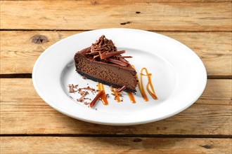 Chocolate cake on big white plate