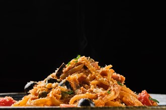 Macro photo of pasta with tomato and olives