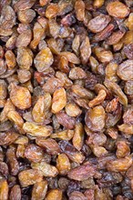 Raisins as background Grape Raisin texture in view