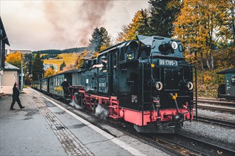 The narrow-gauge railway Fichtelbergbahn shortly in front of the start in Oberwiesenthal at the station