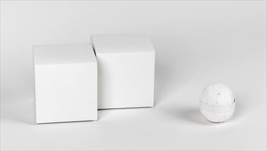 Front view white bath bomb with boxes