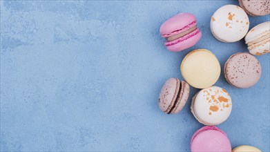 Flat lay assortment macarons with copy space