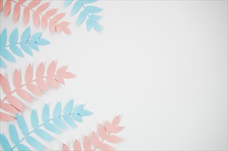 Grey copy space background with pink blue foliage