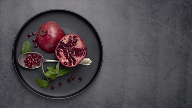 Top view plate with mint pomegranate. Resolution and high quality beautiful photo