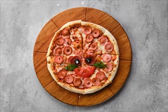 Top view of pizza for kids with sausage and cheese