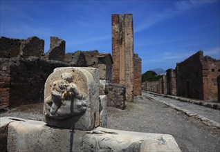 Fountain in one of the former residential streets in Pompeii