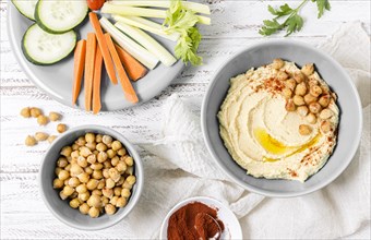 Top view hummus with chickpeas vegetables. Resolution and high quality beautiful photo