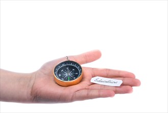 Isolated compass in hand on a white background