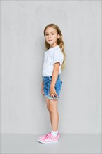 Little child girl in white t-shirt