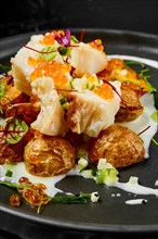 Roasted cod fillet with deep fried spring potato