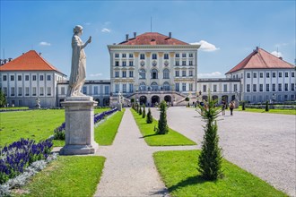 Park view with sculpture of Nymphenburg Palace