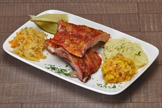 Plate with smoked ribs with mashed potato