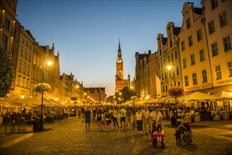 Hanseatic league houses with the town hall after sunset in the pedestrian zone of Gdansk. Poland