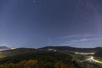 Mountain landscape with starry sky