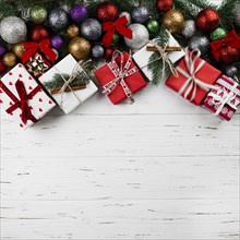 Christmas composition of gift boxes and baubles