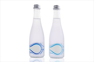Two bottles of mineral water isolated on white background