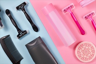 Gender tax and stereotypes concept for products marketed toward women to be more expensive than those marketed for men showing various pink and black personal care and hygiene products like shower gel