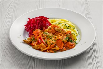 Plate with beef goulash
