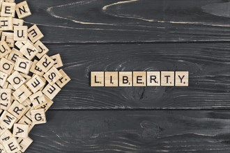 Liberty word wooden background