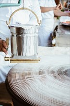 The making of Turkish desert Kadayif pastry in display