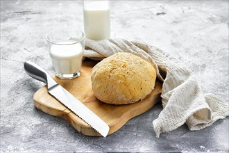 Fresh homemade yeast-free bread and milk