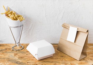 French fries food parcel mock up wooden table top