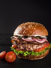Ready be served classic hamburger with cherry tomatoes 1