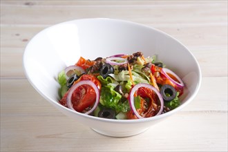 Salad with fried tomato