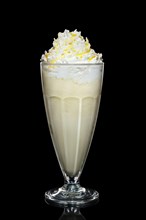 Banana milk cocktail with whipped cream
