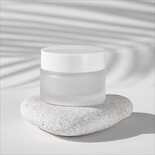 Skin care moisture recipient on a white rock