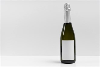 Champagne bottle with white background