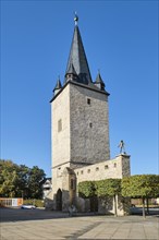 City wall at the Johannistorturm with the bronze figure of the polymath Adam Olearius by sculptor Bernd Goebel