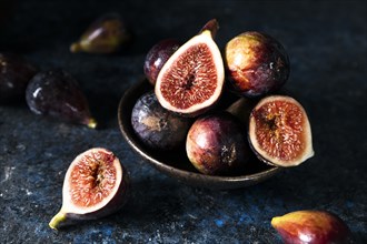 High angle bunch autumn figs plate