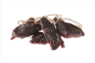 Overhead view of dried jerked deer or venison meat isolated on white background