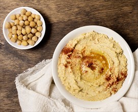 Top view bowl hummus with chickpeas. Resolution and high quality beautiful photo