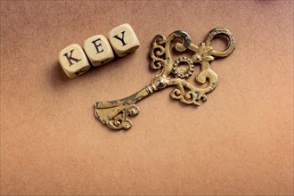 Retro stlyle key beside a key wording in view