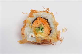Piece of chicken and salmon teriyaki roll