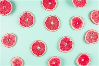 Pattern grapefruit citrus slices pastel backdrop. Resolution and high quality beautiful photo