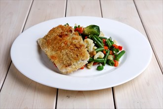 Fried fish with vegetables